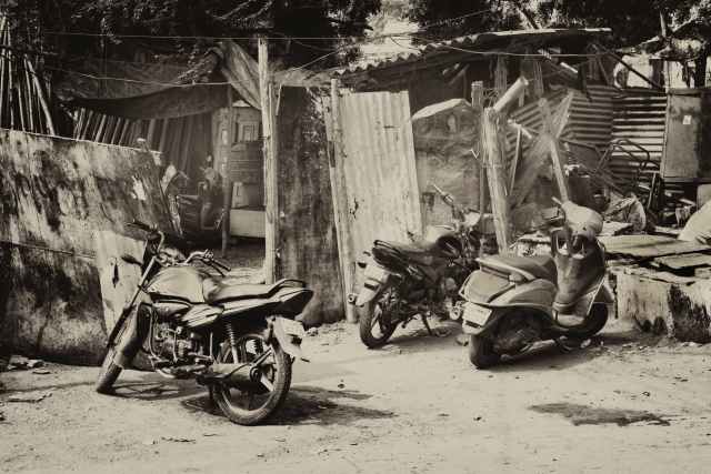 grayscale photo of motorcycles